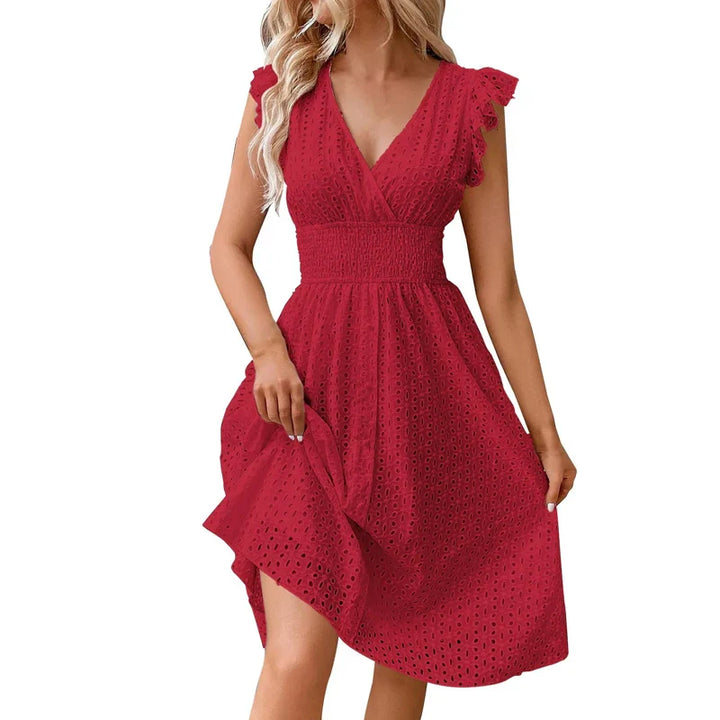 "Women's V-Neck eyelet summer dress with smocked waist, ruffled sleeves, and knee-length A-line in light fabric."