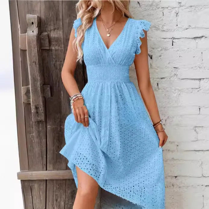 "Women's V-Neck eyelet summer dress with smocked waist, ruffled sleeves, and knee-length A-line in light fabric."
