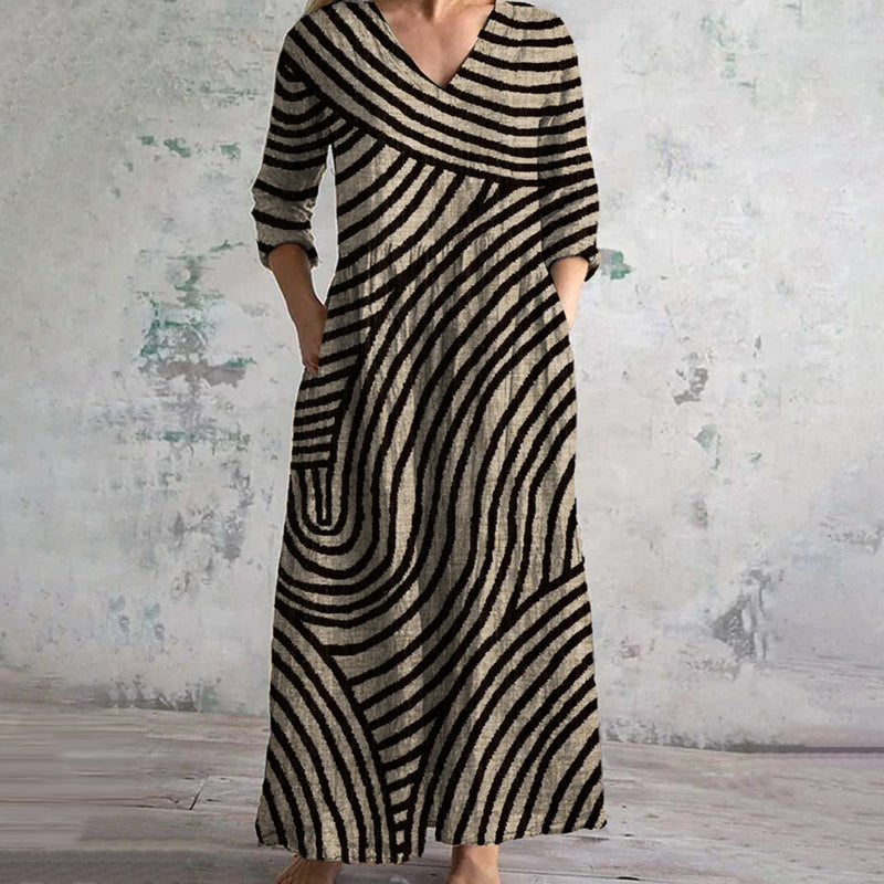 "Women's vintage stripe maxi dress with pockets, featuring a retro stripe pattern and relaxed fit, perfect for all occasions.