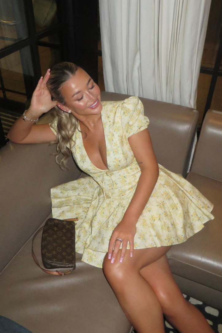 Elegant women's yellow floral party dress, A-line mini with puff sleeves & a stylish open back. Summer essential.