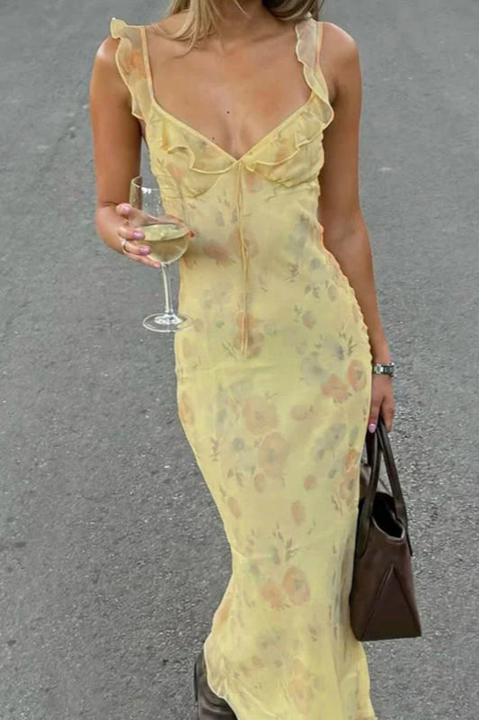Yellow floral spaghetti strap maxi dress for women, perfect for summer beach wear or vacation.
