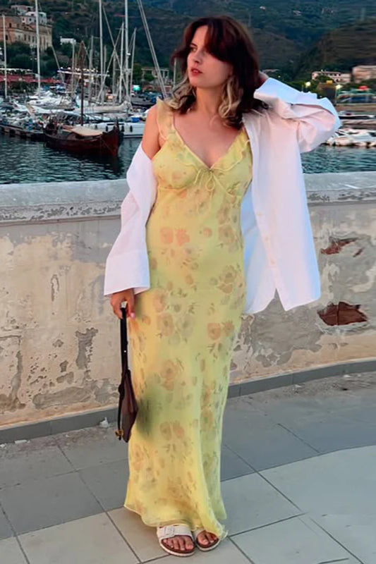 Elegant women's floral slip maxi dress with spaghetti straps, ideal for summer casual or vacation.