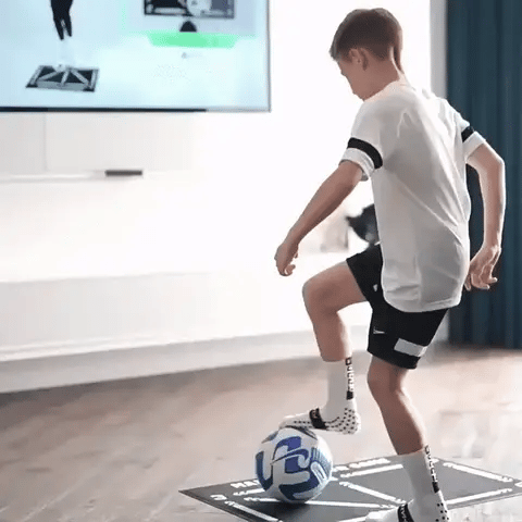 Portable youth football training mat, perfect for home practice and skill development with video guidance.